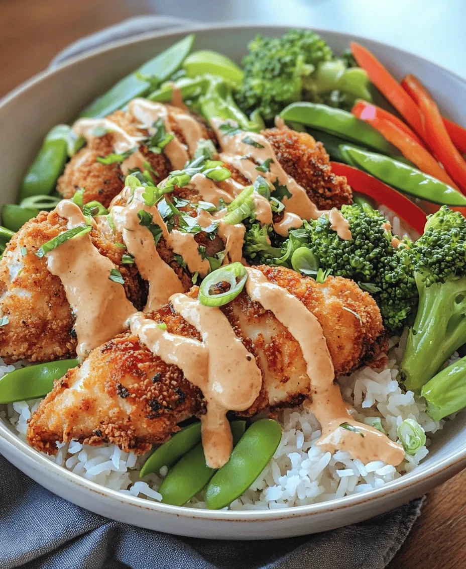 If you're searching for a dish that combines vibrant flavors, eye-catching presentation, and wholesome nutrition, look no further than the Bang Bang Chicken Bowl. This delightful meal is a feast for both the eyes and the palate, showcasing tender chicken, colorful vegetables, and fragrant rice, all beautifully drizzled with a creamy and spicy Bang Bang sauce. It not only satisfies hunger but also offers a burst of flavors that will make your taste buds dance.
