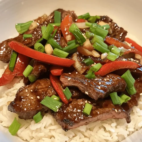 In the world of quick and delicious meals, few dishes can rival the vibrant flavors of sizzling pepper steak with onions. This delectable stir-fry recipe showcases tender flank steak, colorful bell peppers, and aromatic garlic and ginger, all expertly tossed in a savory sauce that tantalizes the taste buds. Perfect for busy weeknights or an impressive dinner gathering, this dish is not only easy to prepare but also a feast for the senses.