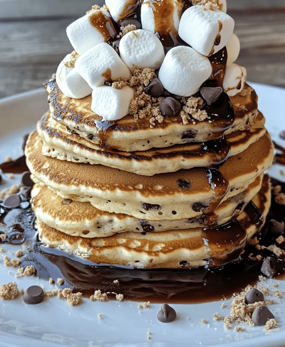 Imagine waking up on a lazy weekend morning, the sun streaming through your kitchen window, and the enticing aroma of freshly cooked pancakes wafting through the air. Now, picture those pancakes infused with the nostalgic flavors of classic campfire s’mores—crispy graham cracker crumbs, gooey marshmallows, and rich chocolate. Welcome to the world of S’mores Pancakes, a delightful breakfast treat that merges the beloved elements of s’mores with fluffy, mouthwatering pancakes.