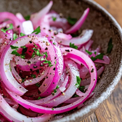 Tangy sumac onions are a vibrant and flavorful addition that can elevate a variety of dishes, from salads to grilled meats, and even as a unique topping for sandwiches. This simple yet sophisticated condiment showcases the ability to transform everyday ingredients into something gourmet. At the heart of this recipe is sumac, a spice that brings a distinct tartness, perfectly complementing the natural sweetness and crunch of red onions.